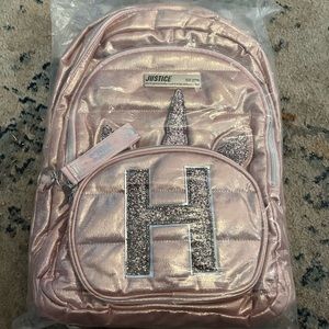 Justice new in bag pink initial H unicorn backpack.